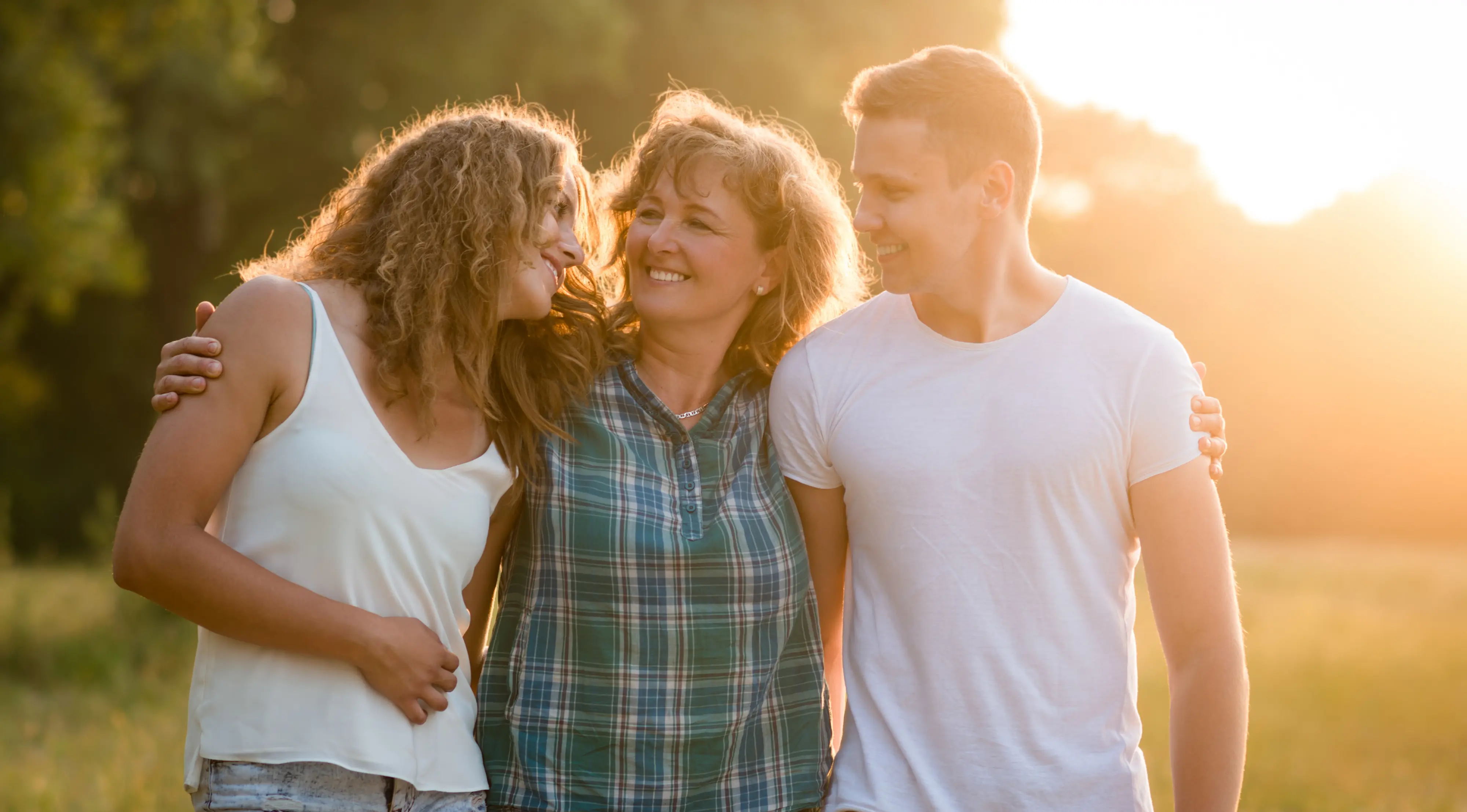 Caucasian family outdoors, spending quality time together.